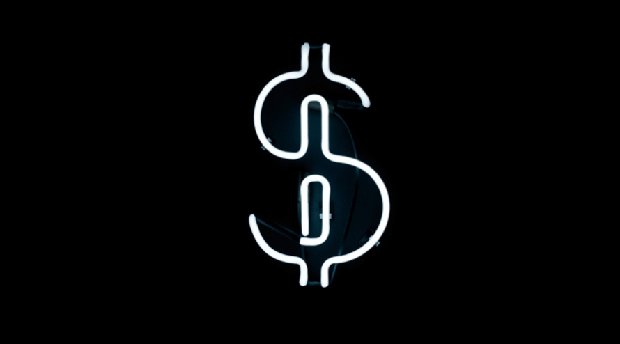 Neon light in the shape of a dollar sign